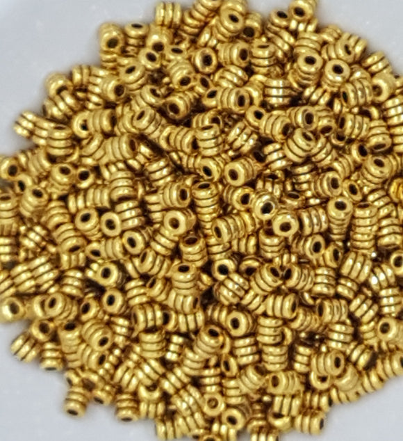 GOLD METAL -4MM X 4MM TIBETAN STYLE BARREL SPACER BEADS