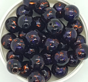 12MM GLASS BEADS - 20 PER PACKET - BLACK WITH FUCHSIA AND GOLD